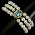 Armband aus Sky Blue Topas mit natürlichen Perlen und Zirkonia