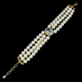 Armband aus Sky Blue Topas mit natürlichen Perlen und Zirkonia