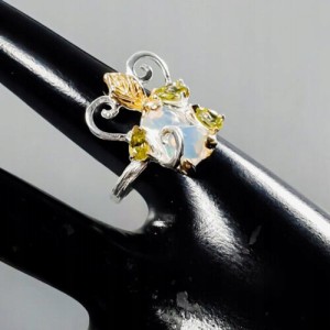 Künstlerischer Ring Größe 16 Peridot Feueropal