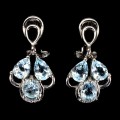 Silberne wunderschöne Sky Blue Topas Ohrringe mit Zirkonia 5