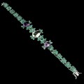Ein silbernes Armband mit natürlichen Amethysten und Smaragden