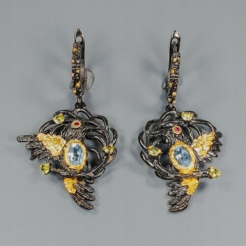 Silberohrringe natürlicher Olivin Saphire Vögel 1